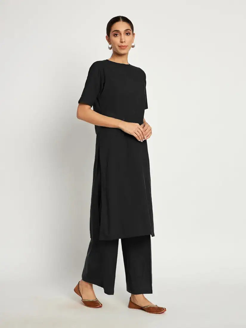 Thevasa Women's Black Rediant Glow Round Neck Kurta